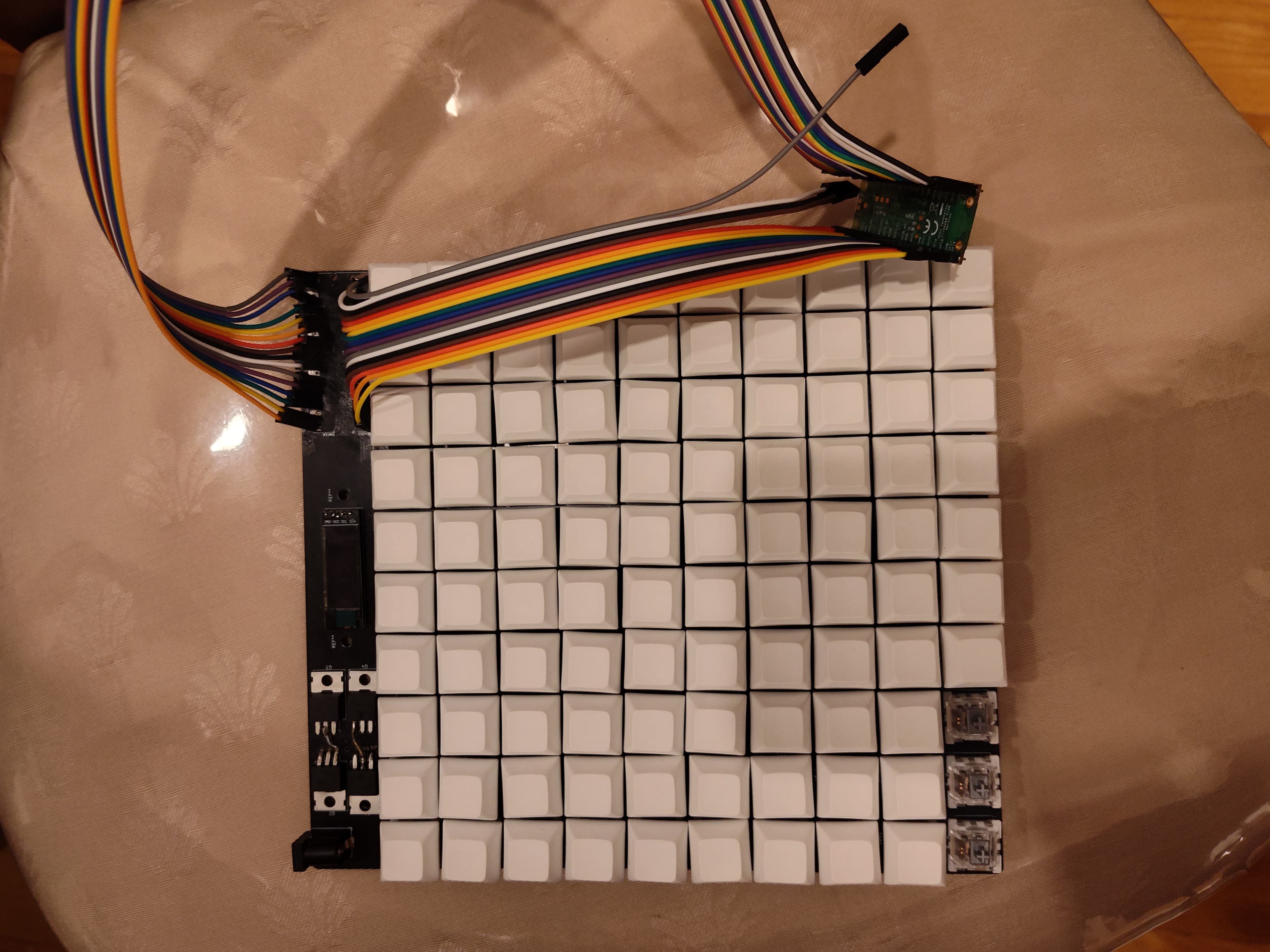 100-Key Macro Pad with per-key RGB backlighting and OLED status display